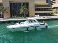 luxury yacht rental the customer enjoying the tour, our crew member explains about the tour.
